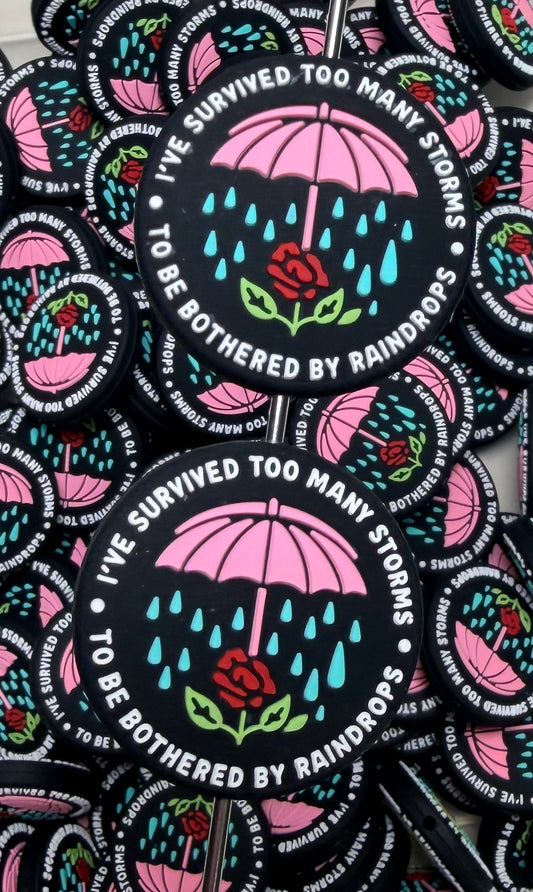 Q- I've Survived Too Many Storms To Be Bothered By Raindrops Focal Bead, Quote Focal Beads